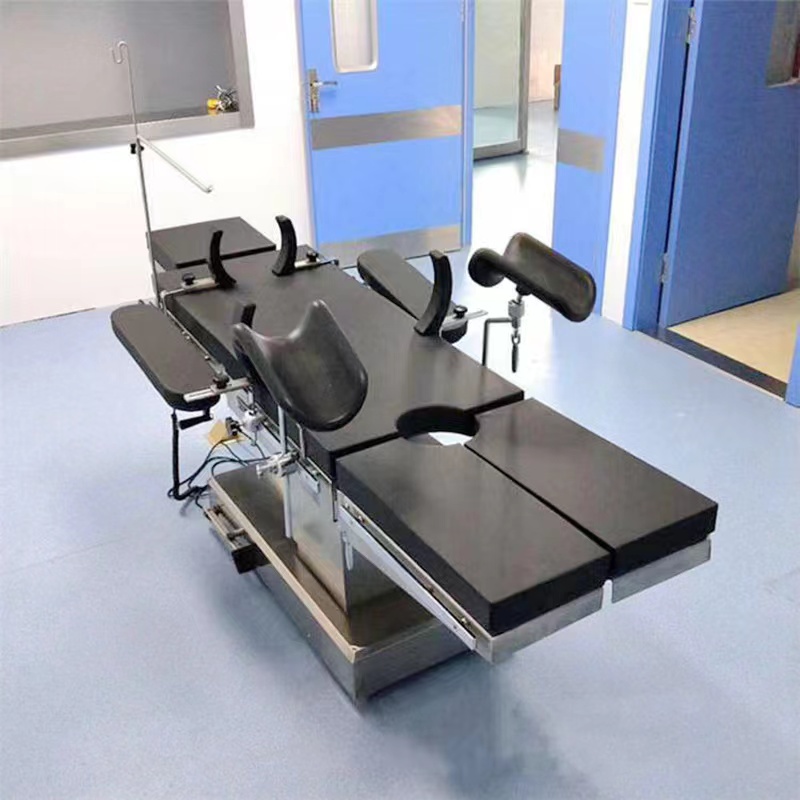 Electric operating table with imaging-friendly tabletop configuration for C-arm fluoroscopy