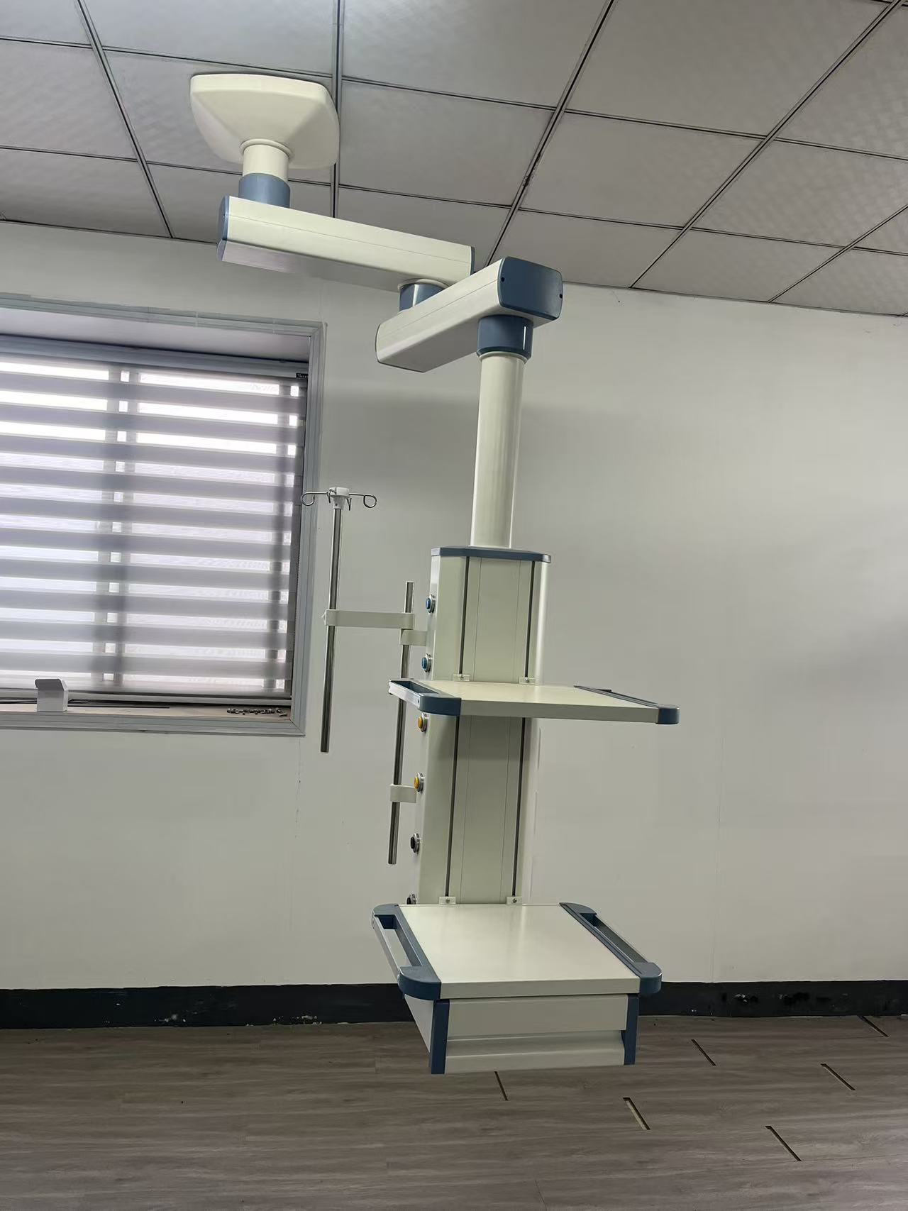 Completed operating room with installed pendant and surgical light ready for final acceptance sign-off