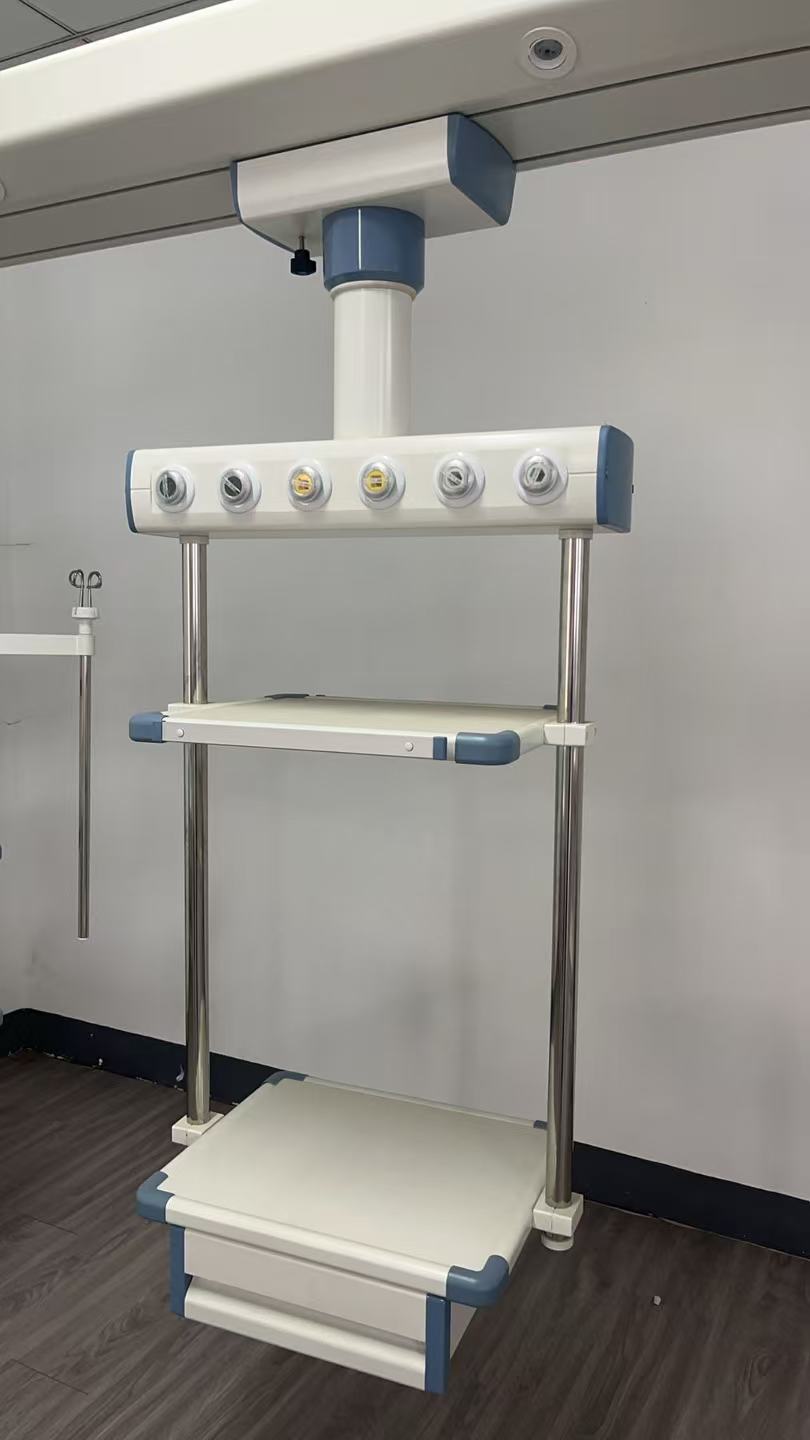 Unité terminale de pendentif médical avec sorties de gaz spécifiques pour oxygène, air médical et vide