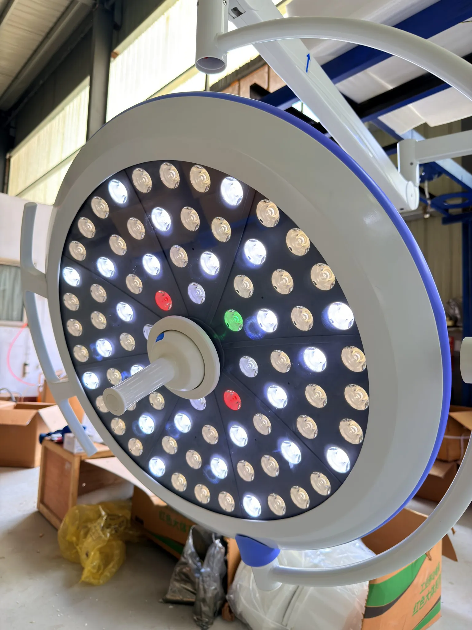 surgical light dome detail showing sealed optical housing, the component inspected during video diagnosis