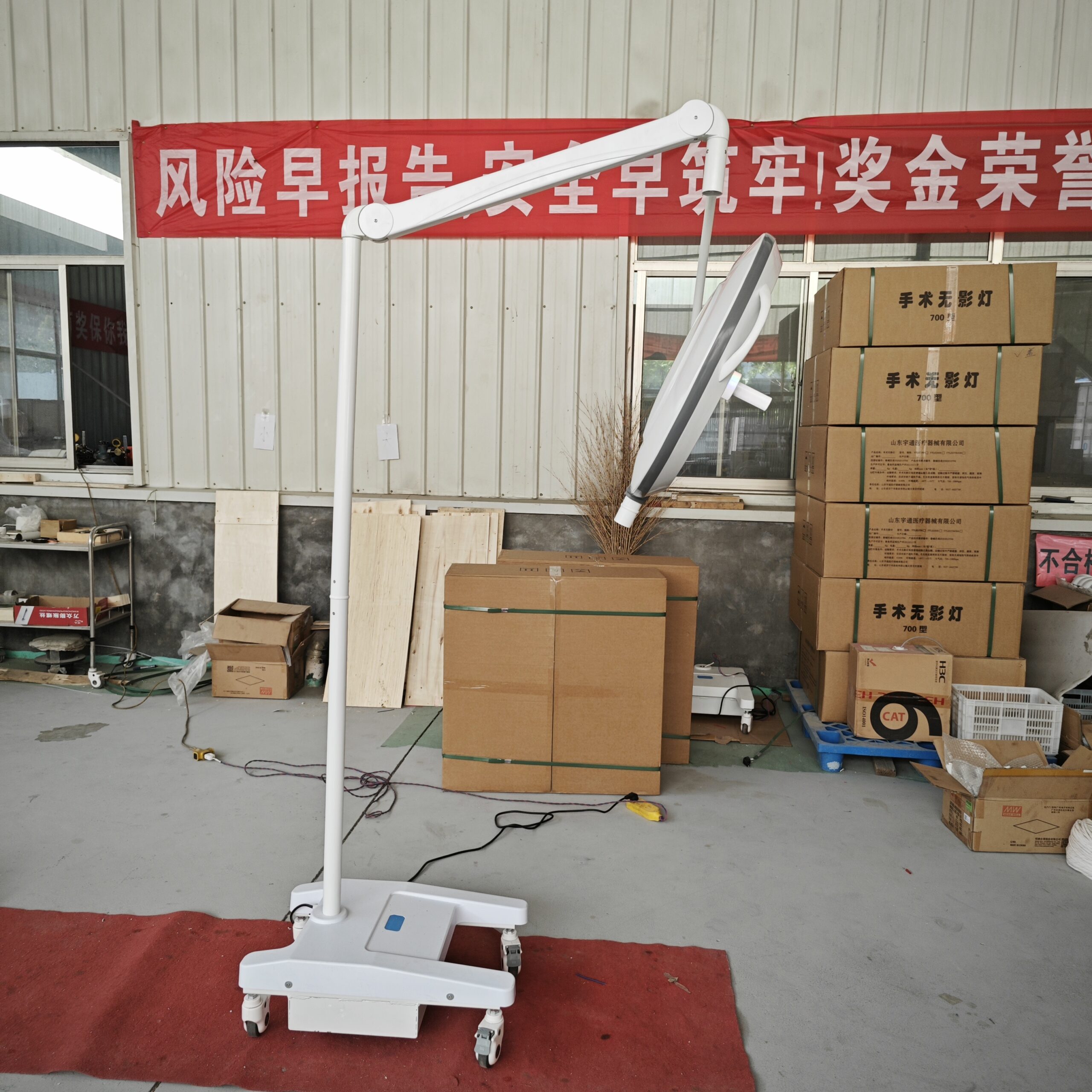 Mobile floor-stand LED surgical light used as a supplementary light source